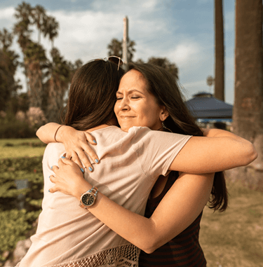 two women hugging