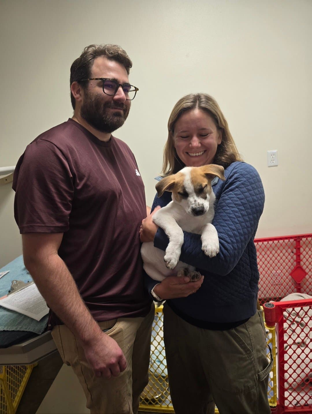 Fin's new mom and dad on the day they adopted him from an adoption event. 