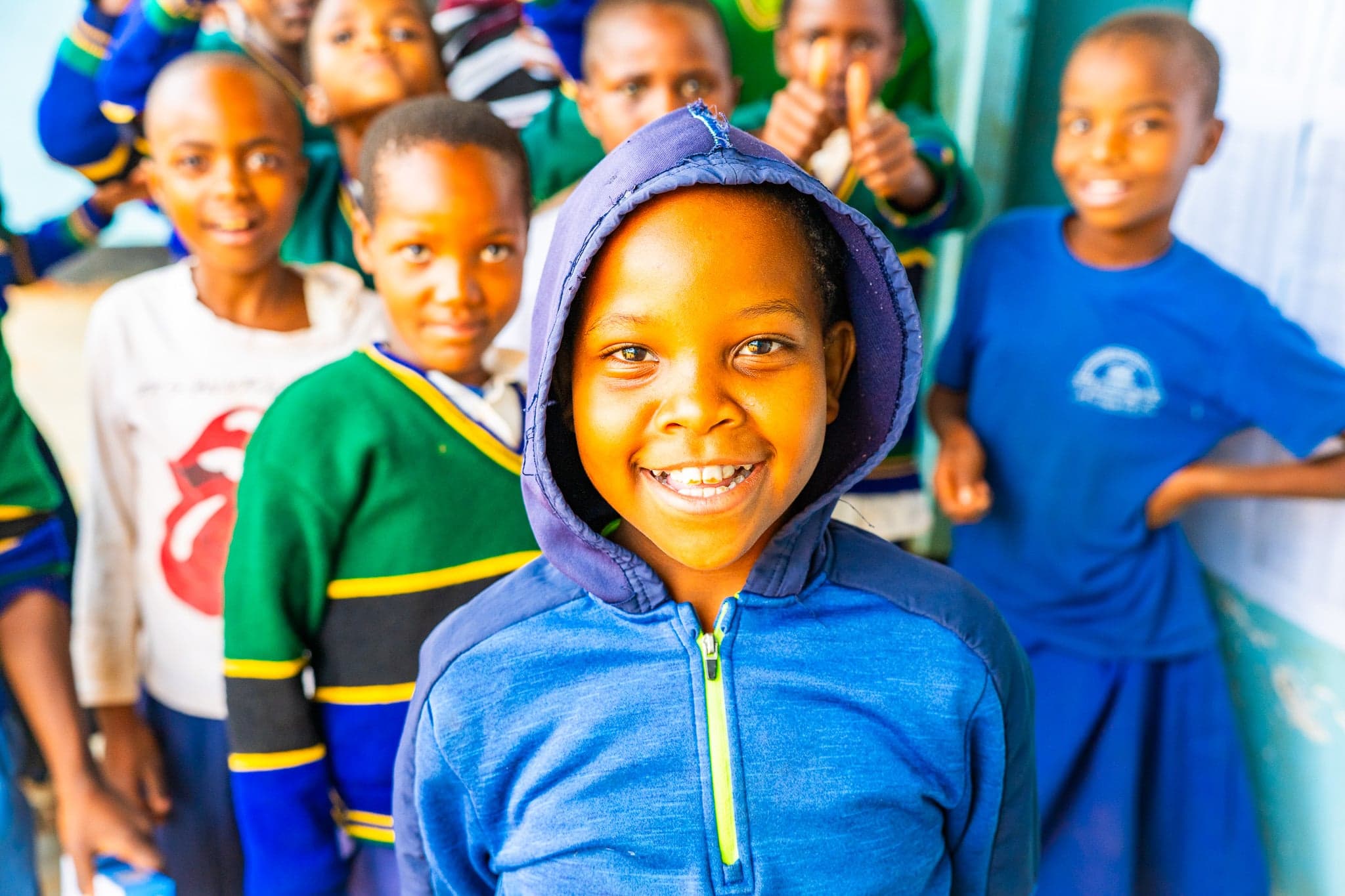 Joyful students smiling and enjoying their time at the Children’s Center.